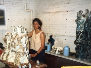 Marcella in a studio in the United States creating a sculpture